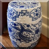 F25. Blue and white ceramic garden stool. 18”h x 12”w 